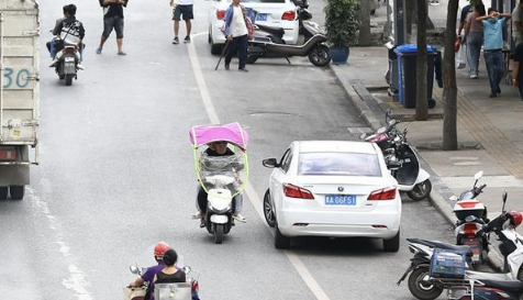 电动车|电动车相撞逆行全责吗